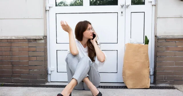 Woman wondering how to get in when she is locked out of her house.